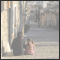 Mother and daughter sitting on the famous stairs of the Kalvarian mountain Pollenca, Mallorca, ESP