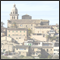 Typical mallorquin village with church tower on a hill and blue sky Porreres, Mallorca, ESP