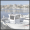 View at the harbour in the front the typical Llauetts fishing boats Cala Ratjada, Mallorca, ESP