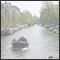 A decorated bicycle basket on a bridge. Amsterdam, NLD